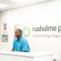 Rusholme Place reception with staff